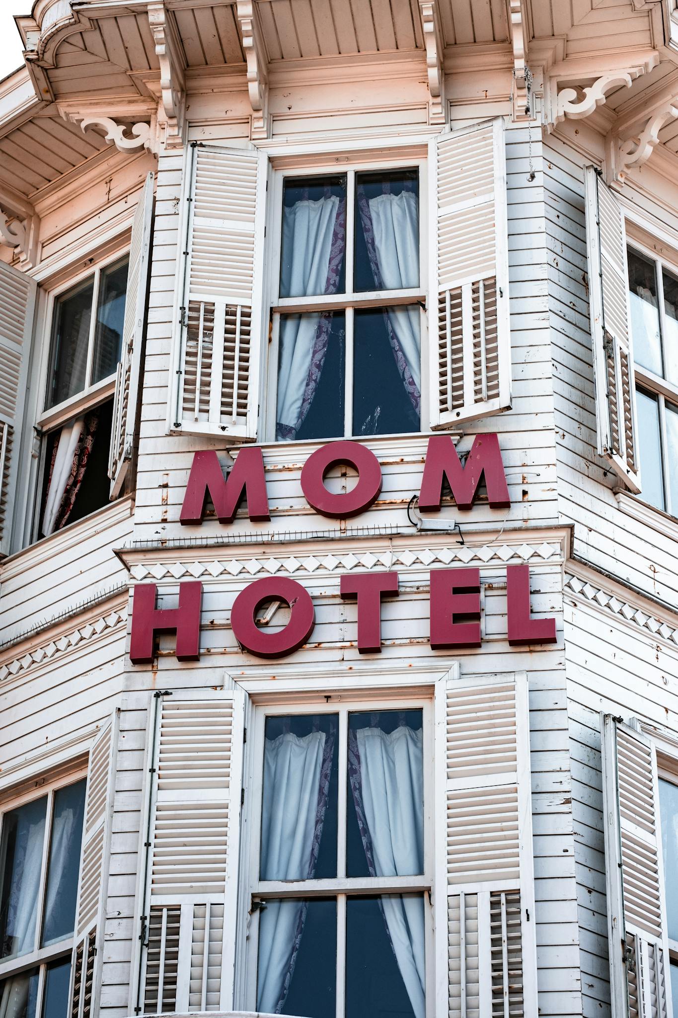 Victorian-style hotel exterior in İstanbul, Türkiye with distinctive signage and architectural details.